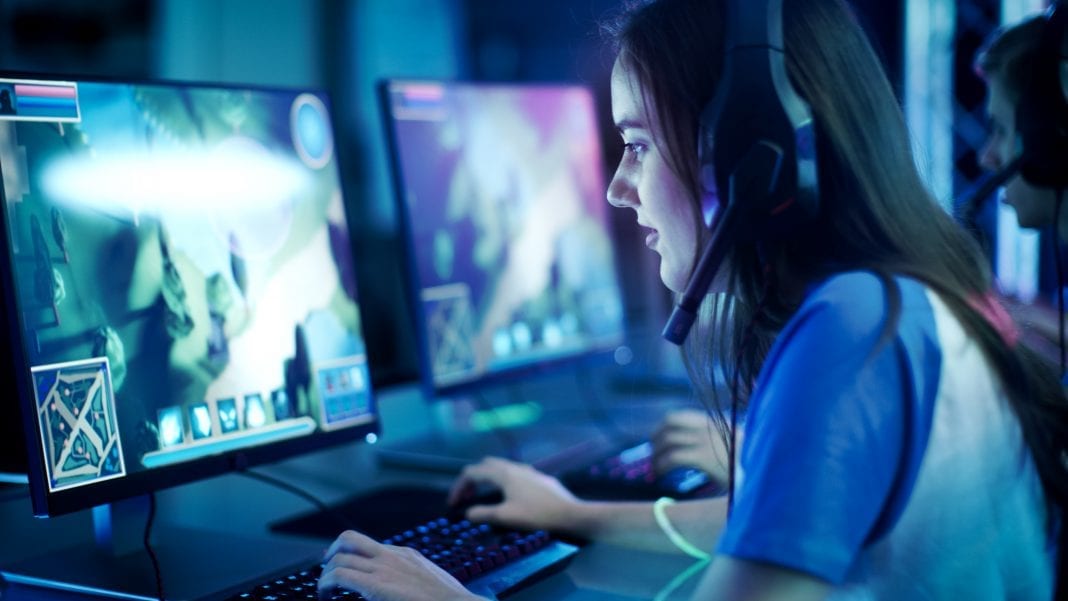 Asian Gamer Winning Online PC Game by seventyfourimages on Envato Elements