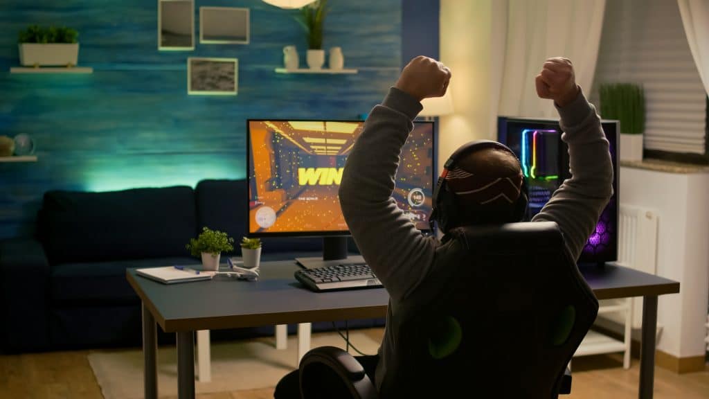 Gamer winning hands in the air