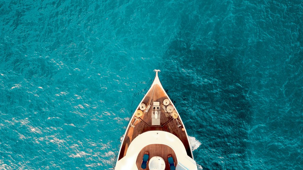 top down view of front of yacht in sea